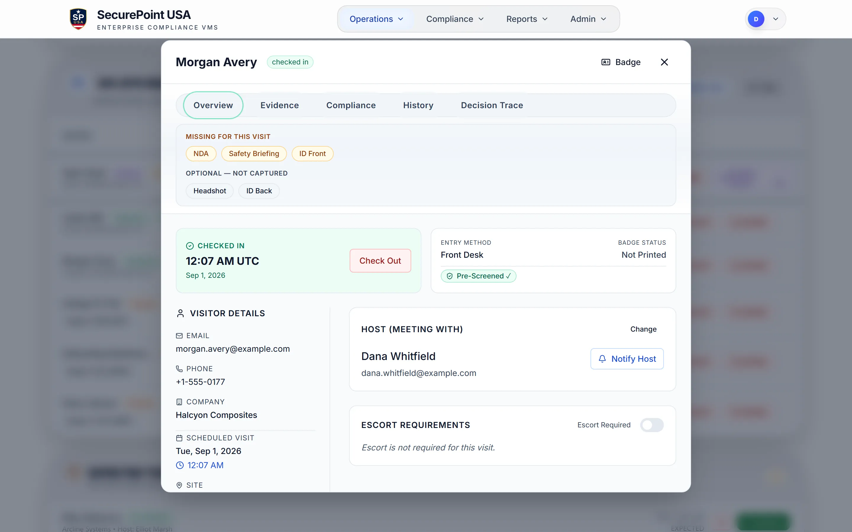 Visitor detail for a checked-in demo visitor listing the NDA, safety briefing, and ID capture still missing before a badge can be issued, alongside host, escort requirement, and badge status